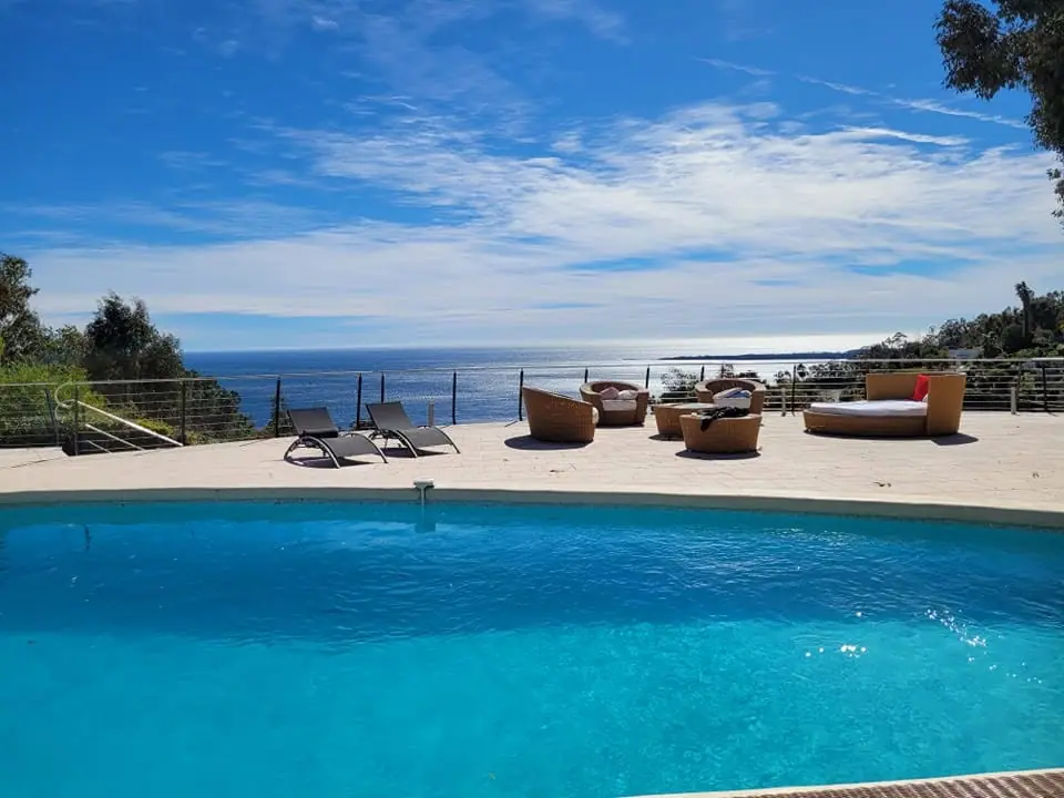 Morning sunlight across the Mediterranean pool