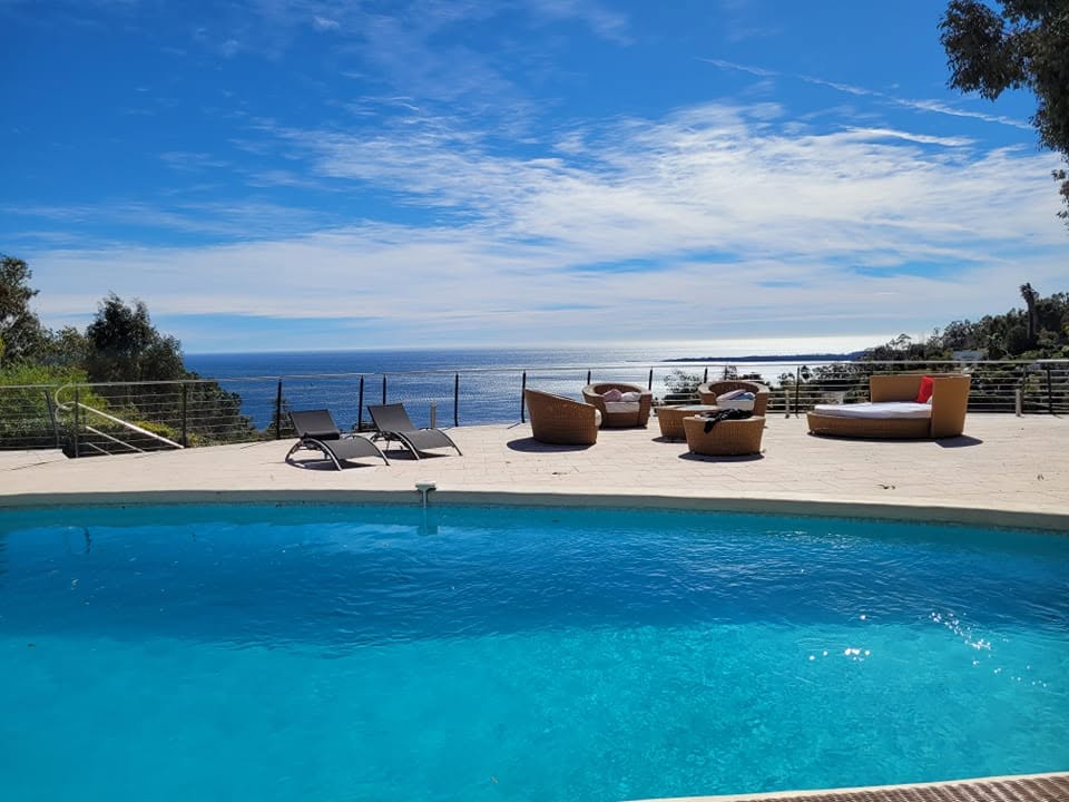 Morning sunlight across the Mediterranean pool