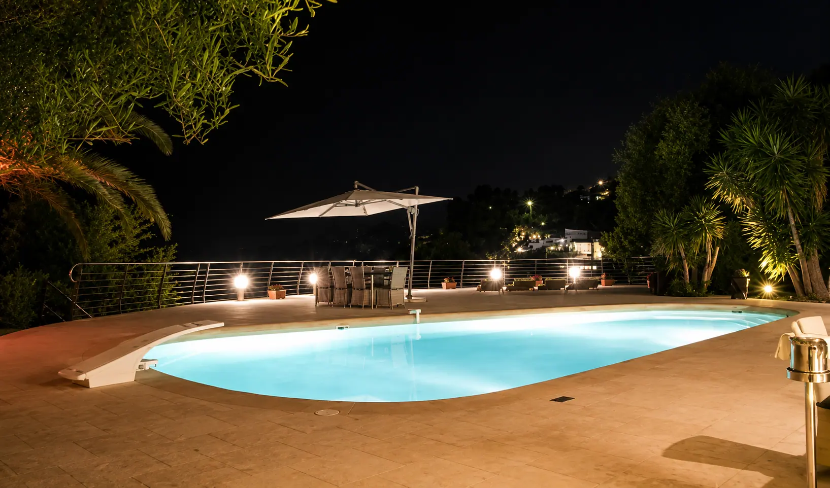 The pool at Villa Oxygène at night